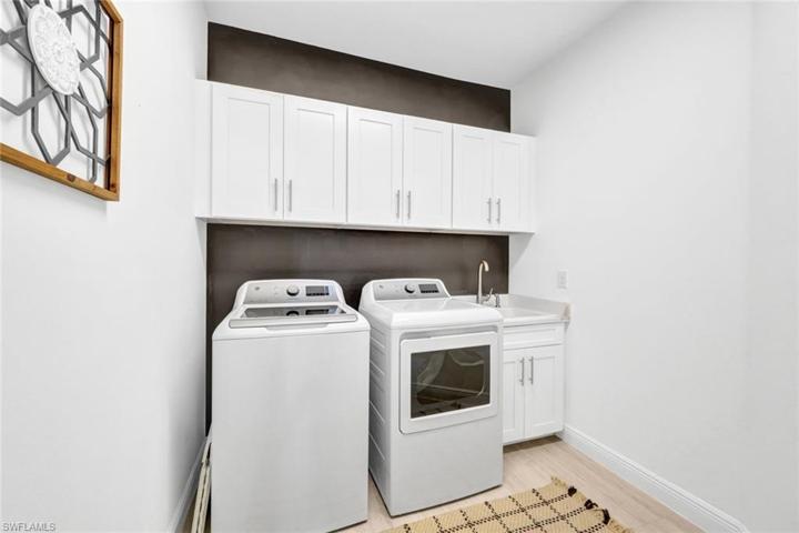 Laundry Room with utility tub