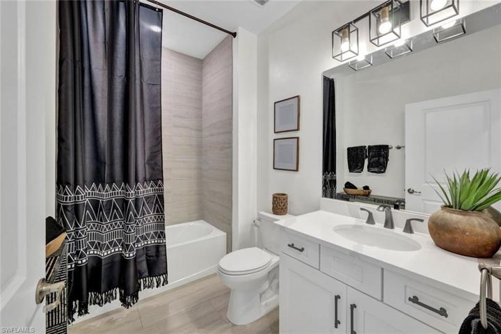 2nd full bath new faucet and vanity lighting