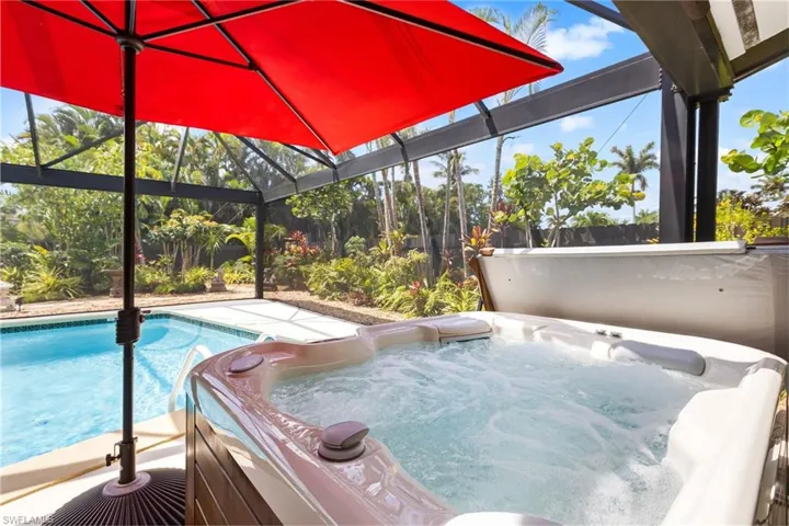 A hot tub just steps away from the primary suite