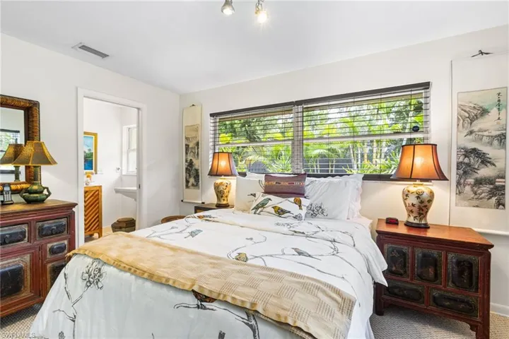 Guest ensuite bedroom with garden views