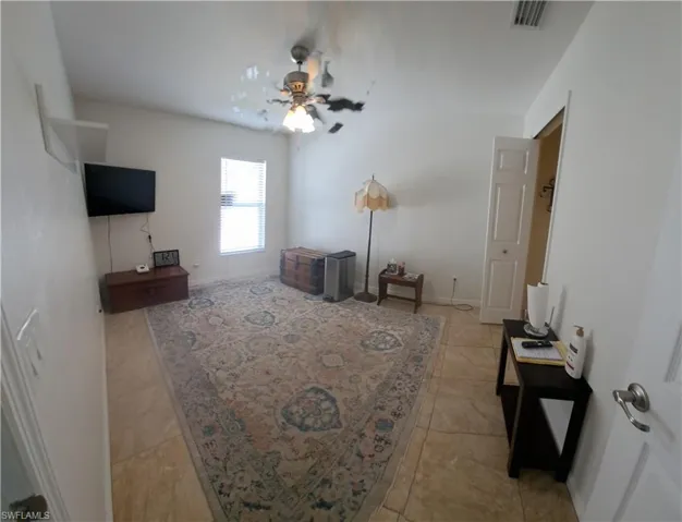 4th bedroom featuring ceiling fan