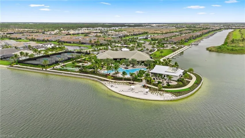 Drone / aerial view featuring a residential view and a water view