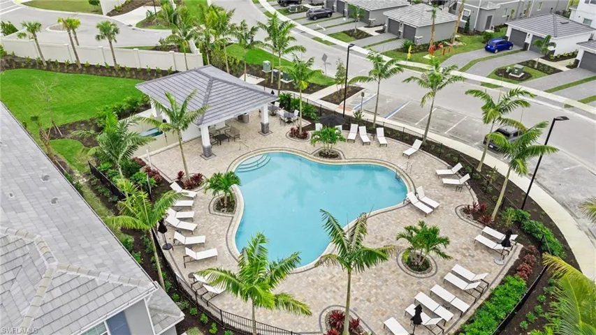 Pool featuring a patio area and fence