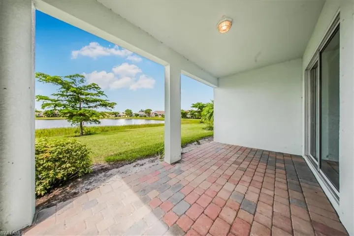 View of patio / terrace featuring a water view and a residential view