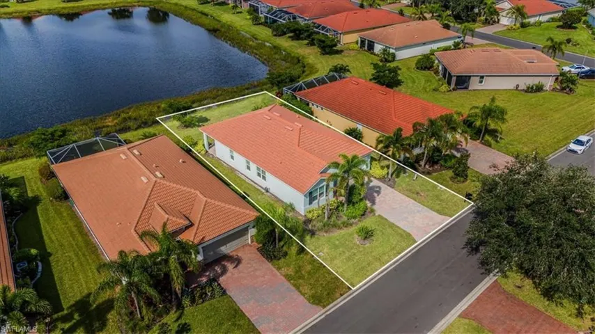 Aerial view of residential area with a large body of water