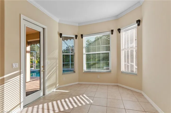 Eating area with entrance to pool