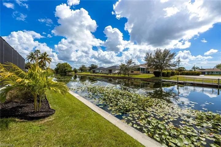 Water view featuring nearby suburban area