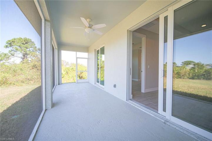 The Covered And Screened Lanai Has Two Sets Of Dual Glass Sliders!