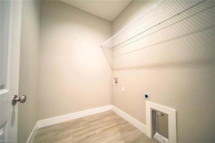 Oversized Laundry Room With Metal Shelving!