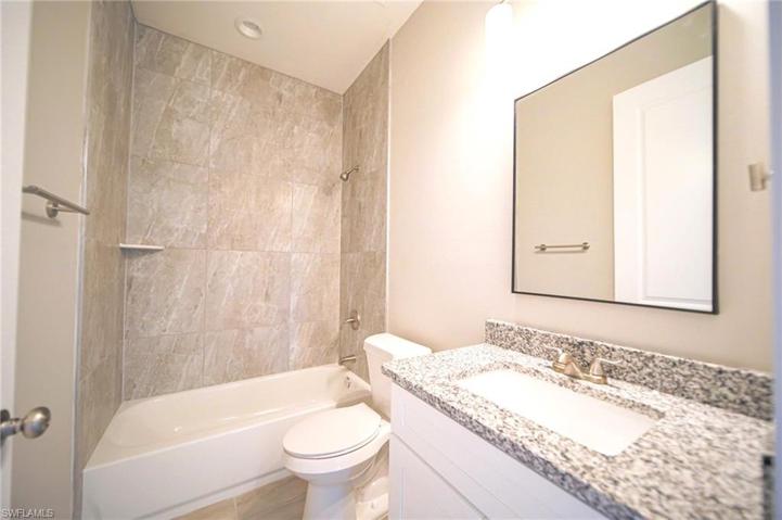 The Spare Bathroom With Tile Tub/Shower!