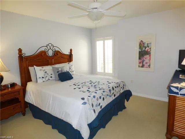 Bedroom with carpet floors and ceiling fan