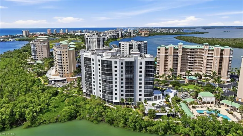 View of urban area featuring a large body of water - Virtually Edited Image