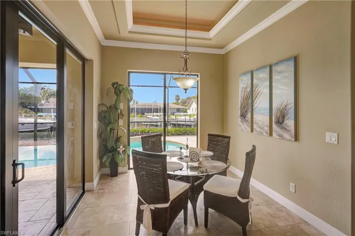 Breakfast nook overlooking pool area.