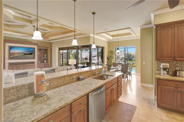 Open concept, breakfast nook, kitchen bar area wide open to lanai.