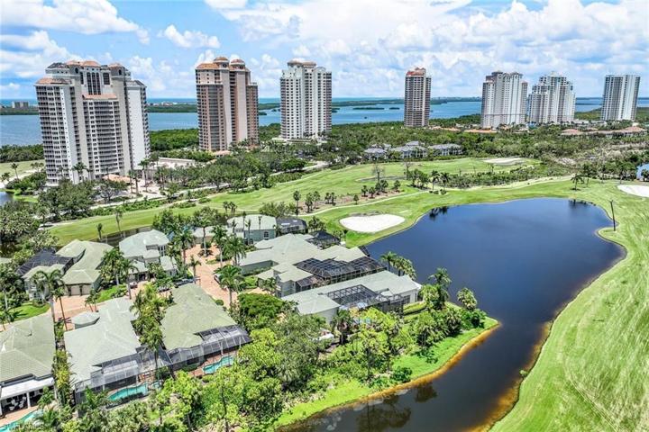 Aerial view. This home sits at the water's edge to the right.
