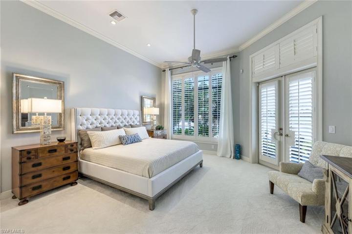 GORGEOUS primary bedroom with rear lanai access.