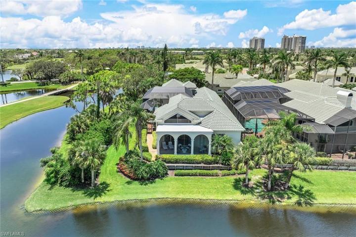This home sits on a CORNER lot with lake & golf course views!