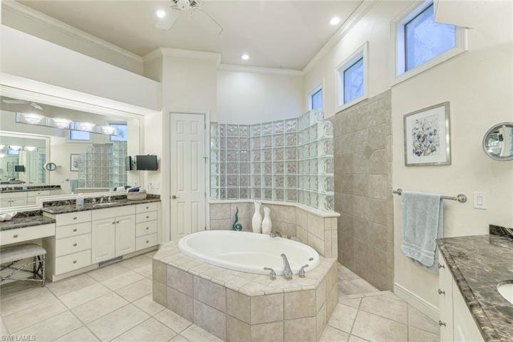 Primary bathroom with SO MUCH space. The soaking tub and shower are both oversized!