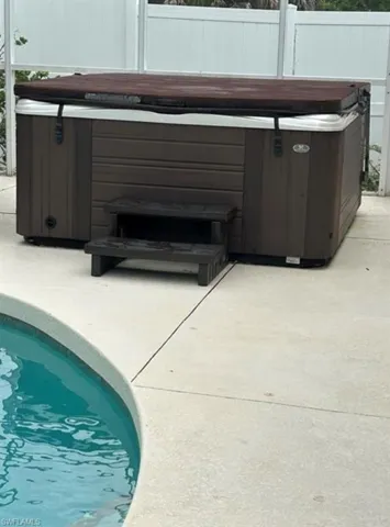Exterior view of a jacuzzi and a pool