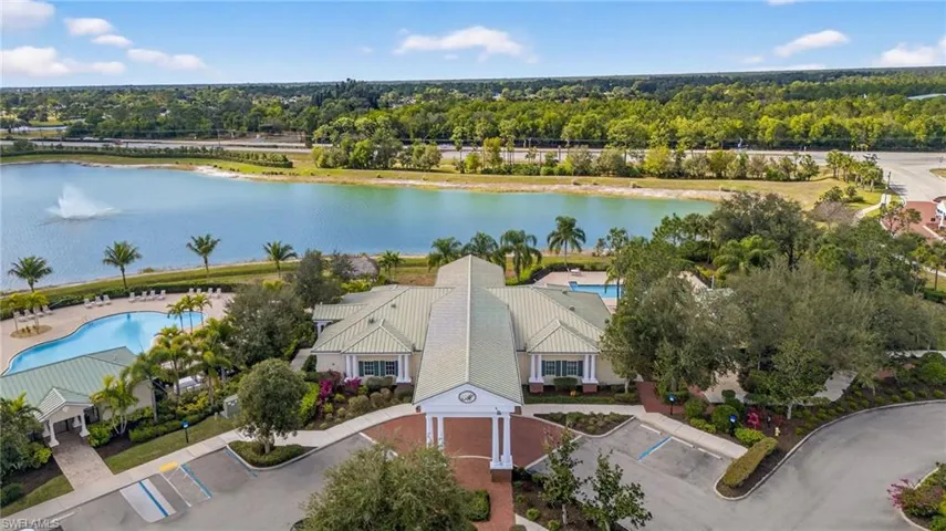 Aerial view of a nearby body of water and a pool