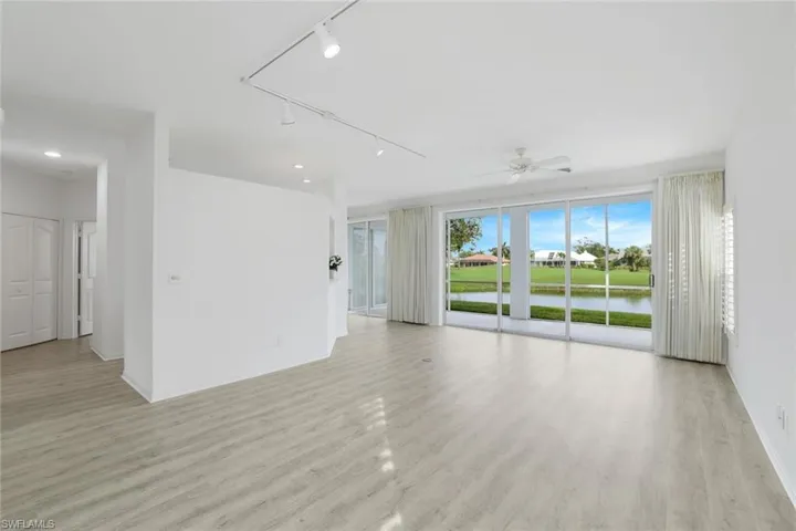 Living area looking to lake and golf course view