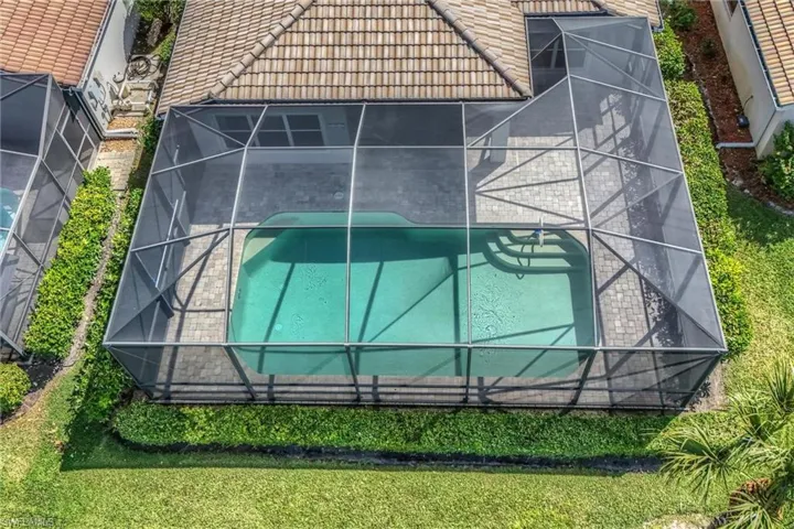 View from above of property featuring a pool