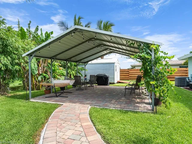 Covered area in the yard ideal for gatherings.