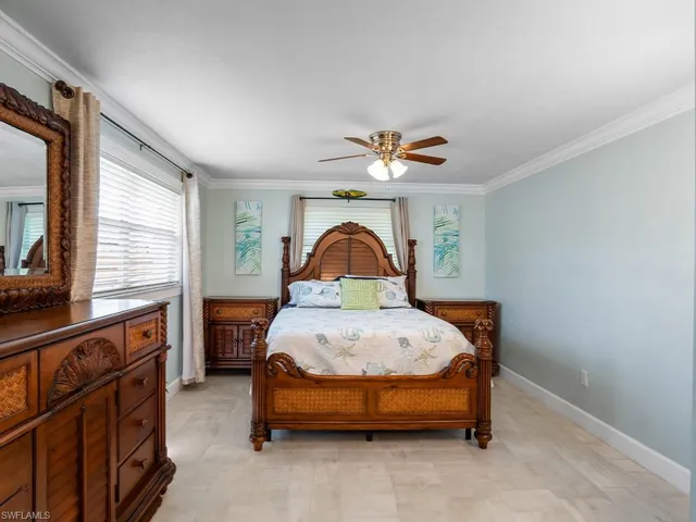 Master bedroom with ceiling fan.