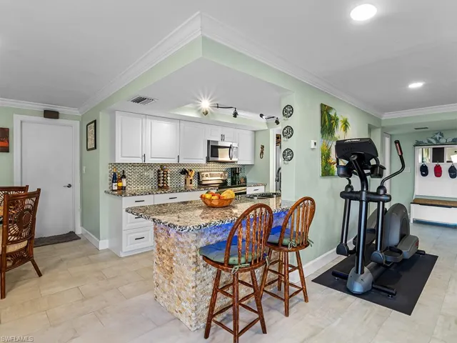 Remodeled kitchen with modern appliances.
