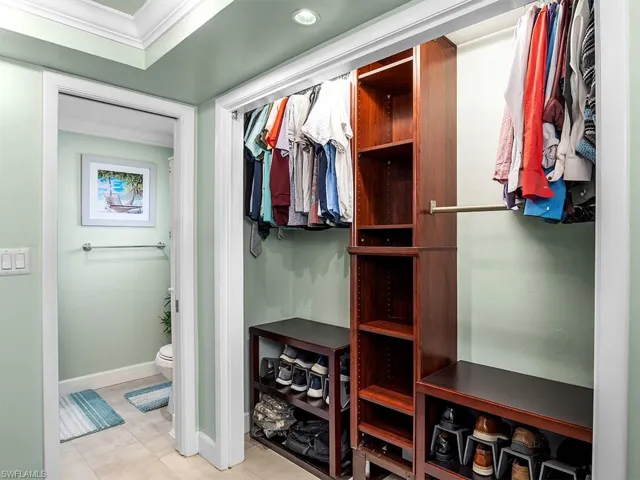 Master bedroom closet with shelves.