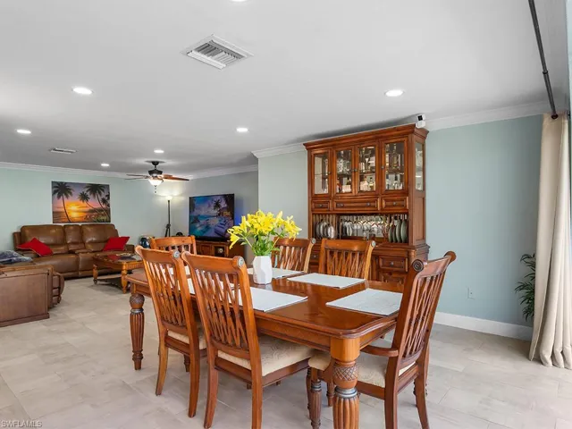 Large dining room with table for six people