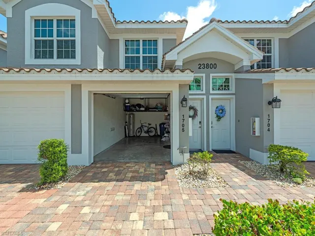 Entrance to property with a garage