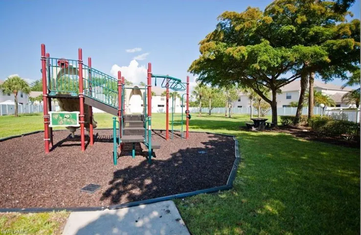 View of play area with a yard