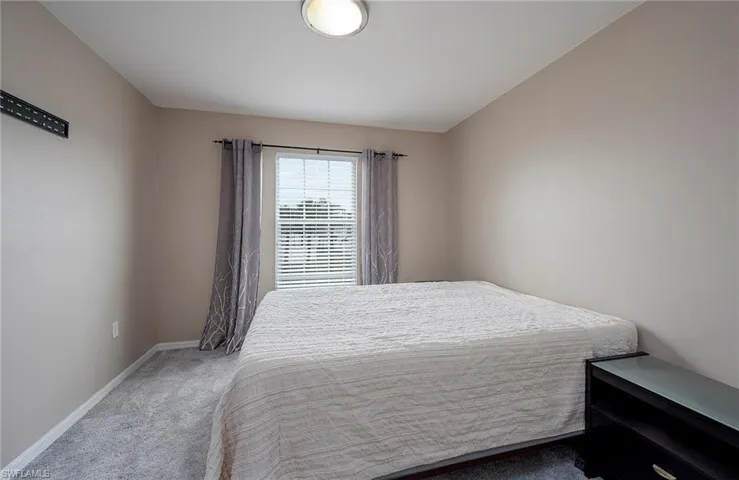 Bedroom featuring carpet