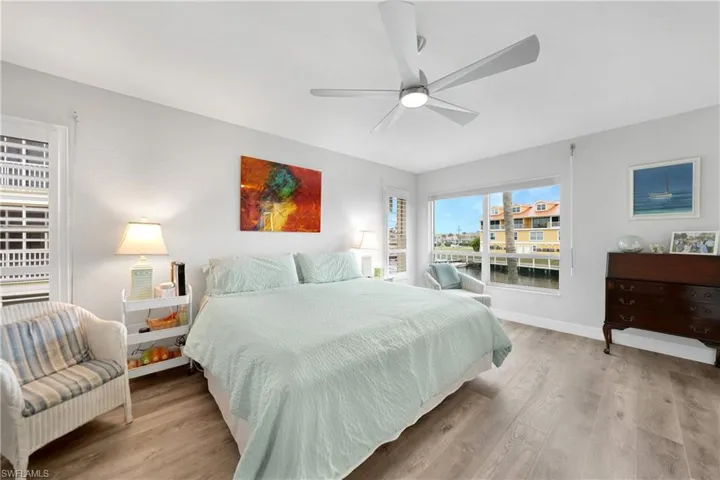 Bedroom with light wood-type flooring and ceiling fan