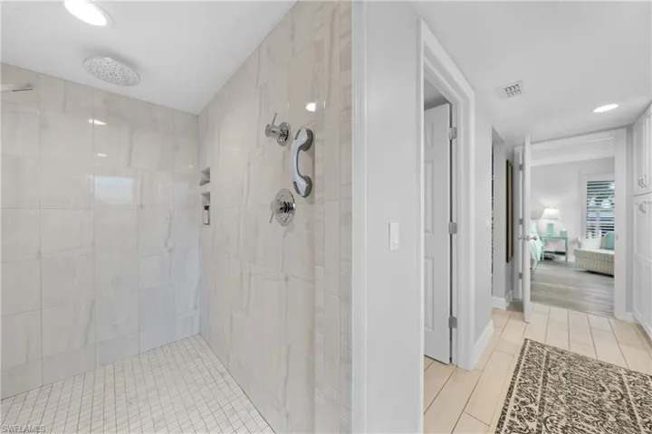 Bathroom with a tile shower