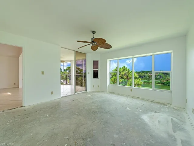 Spare room with ceiling fan