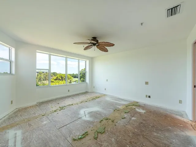Spare room with ceiling fan