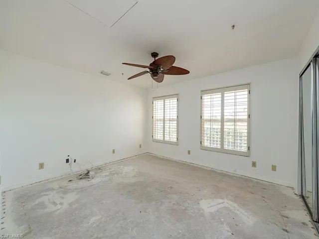 Unfurnished room featuring ceiling fan