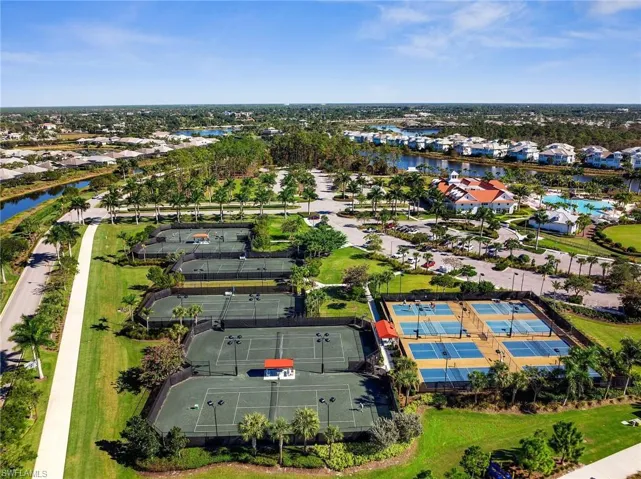 Aerial view of residential area with a nearby body of water