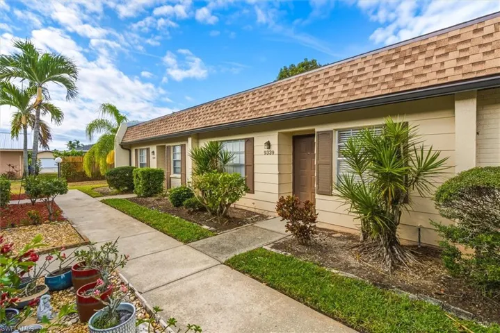View of front of property featuring roof with shingles