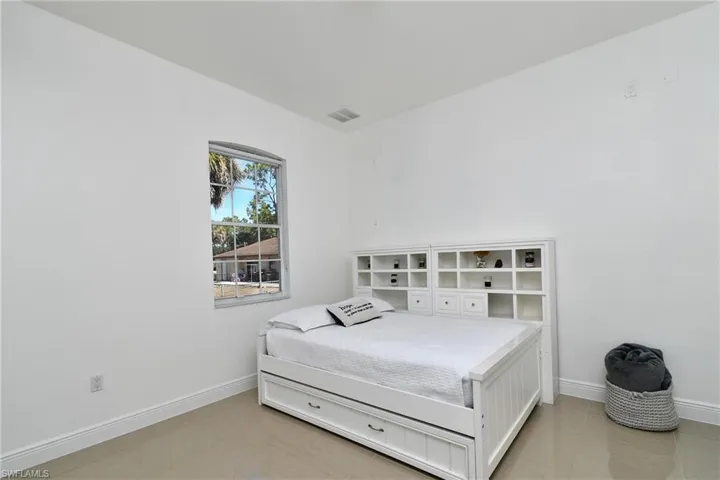 Bedroom with baseboards