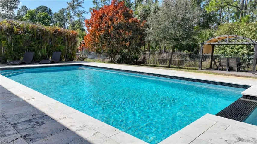 View of pool featuring patio surround