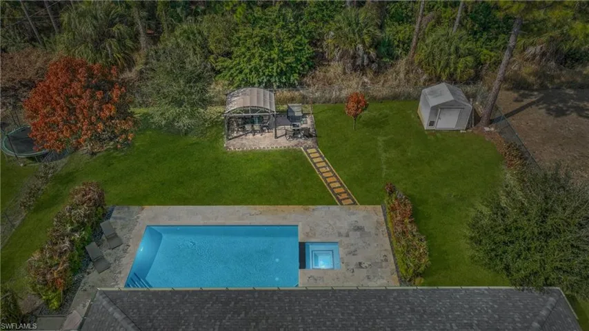 Drone / aerial view of a pool