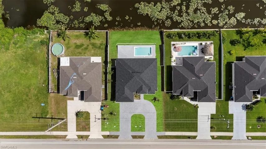 Aerial view of residential area with a pool