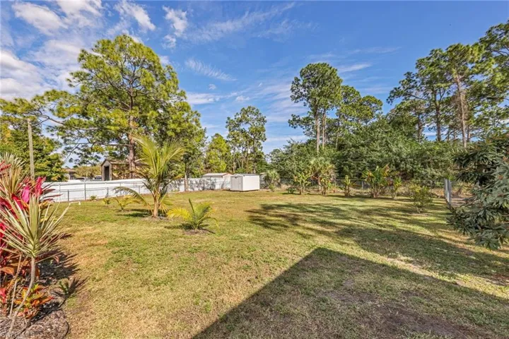 View of fenced backyard