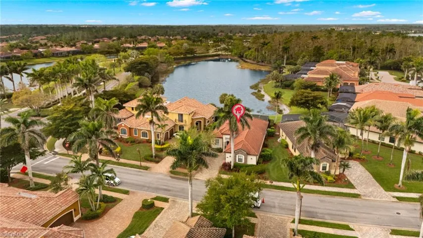 Bird's eye view featuring a water view and a residential view