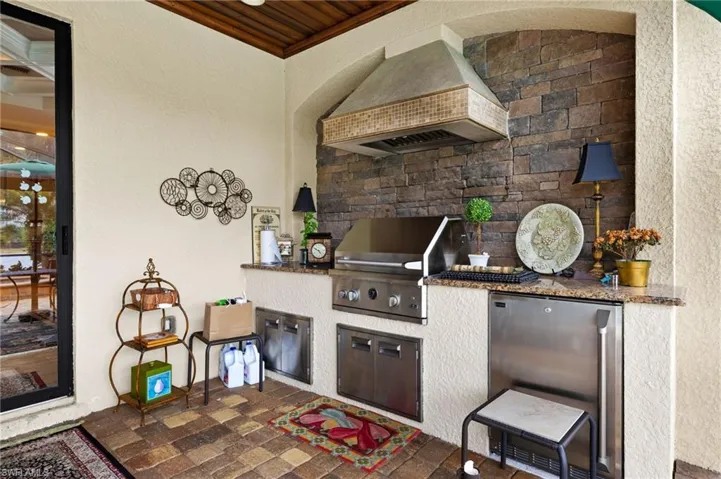 View of patio featuring area for grilling