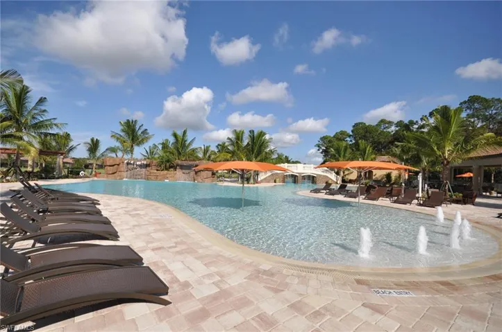 Community pool featuring a patio