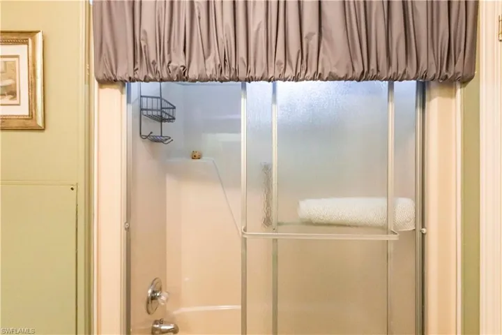 Full bath featuring bathtub / shower combination